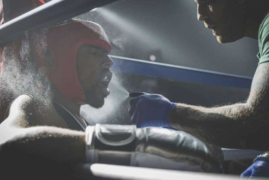 Gloves on punching bag